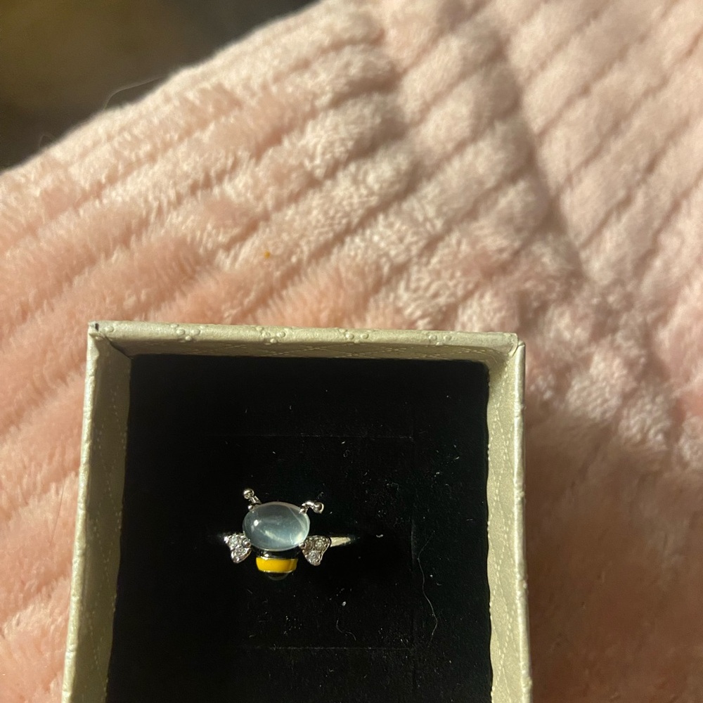 Elegant Silver and Gold Ring with Gem Accents